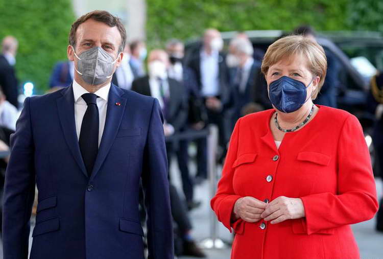 Меркел и Макрон на иста линија